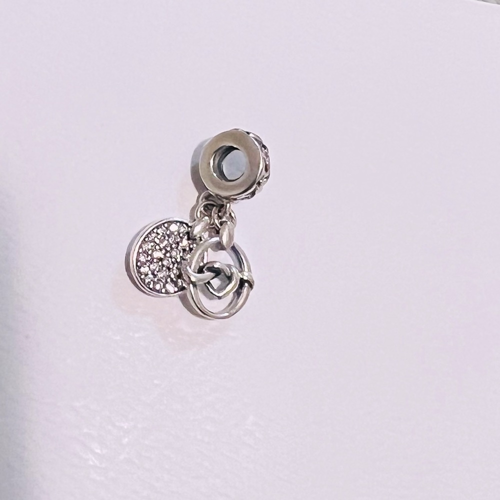 Authentic  Pandora knotted Hearts dangle charm